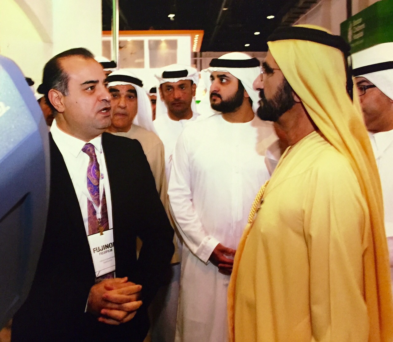 Dr. Rafik briefing UAE leadership at a healthcare exhibition